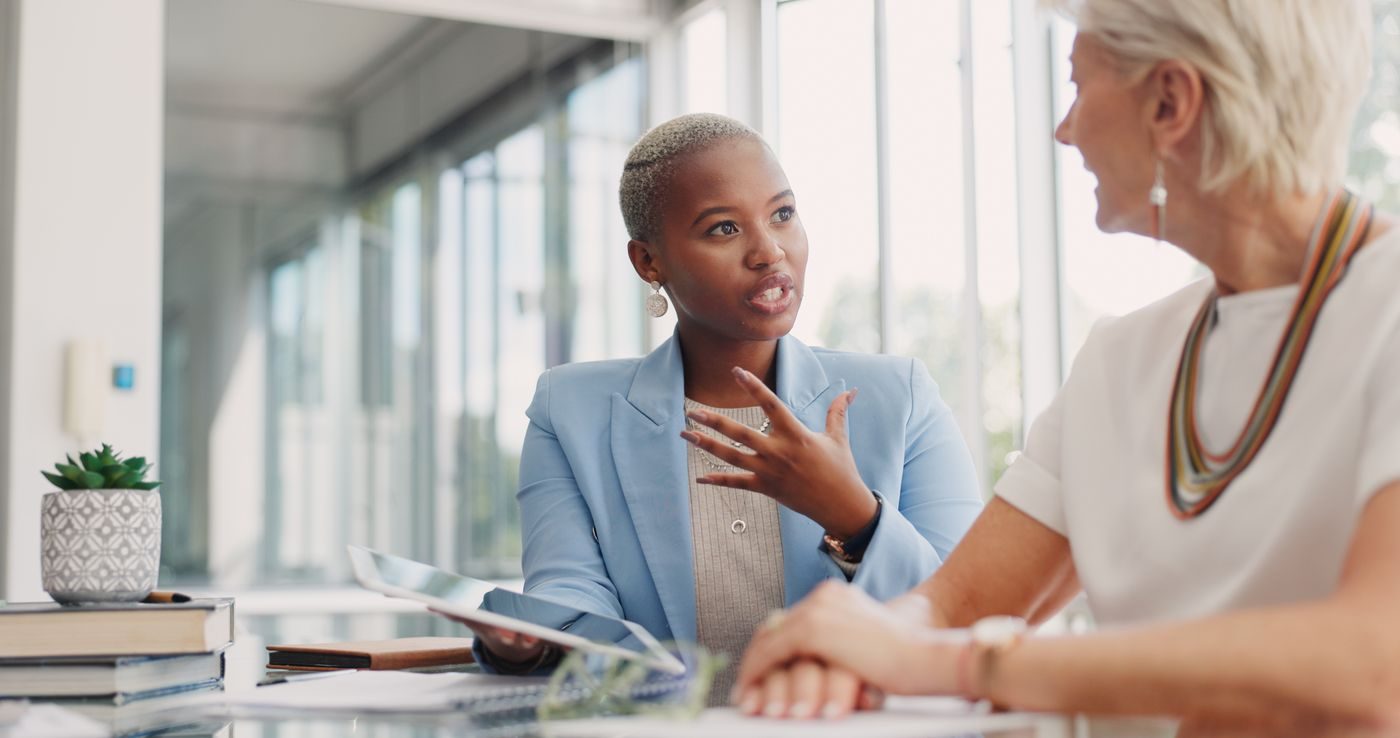 An advisor and attorney in conversation